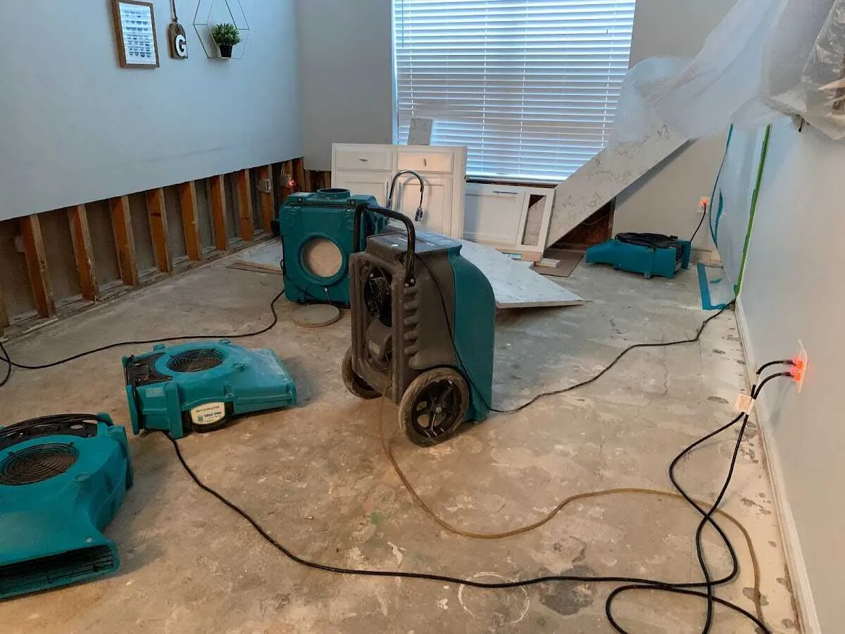 Dehumidifier in flood-cut room for Water Damage Restoration in Cheltenham